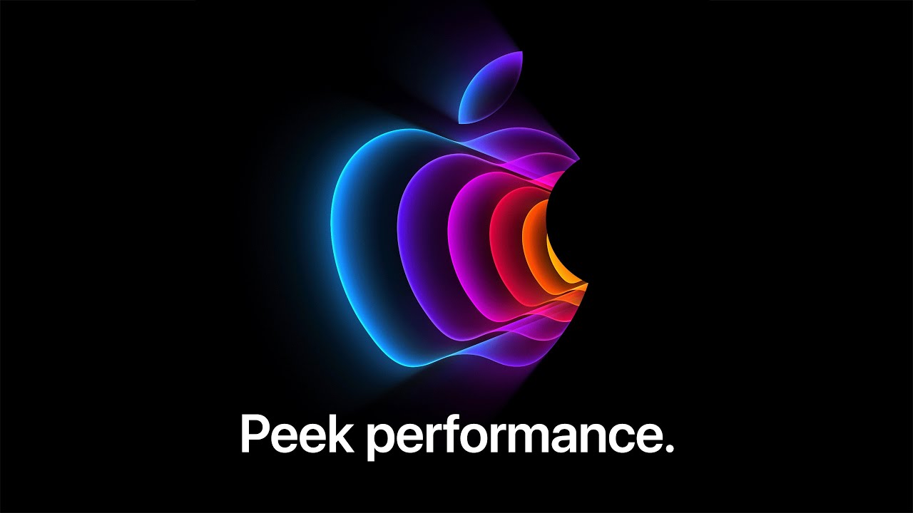 Apple in spectrum of colours set in front of black background. The text Peak Performance is under the Apple.