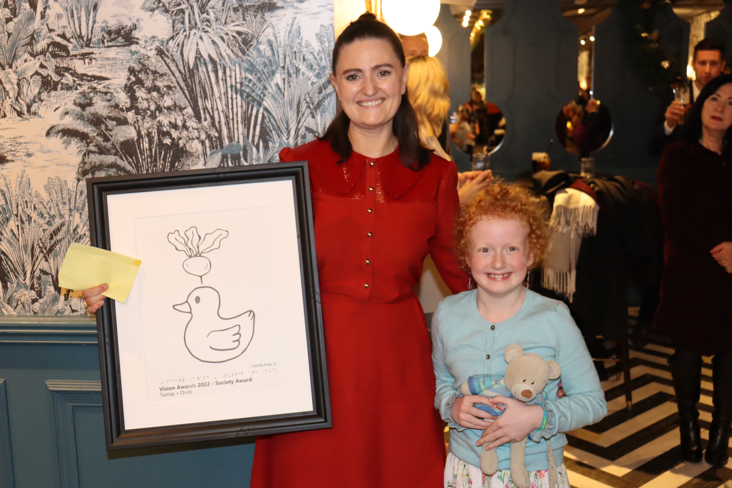 Society Award accepted by Bonnie O’Meara and Laura Cannivan Hayes for their work on a children's cartoon which has blind and vision impaired characters