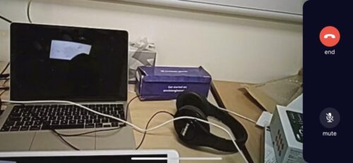 Laptop and headphones on a desk